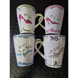 Four Rosanna Mugs with a shoe theme and French quotes.